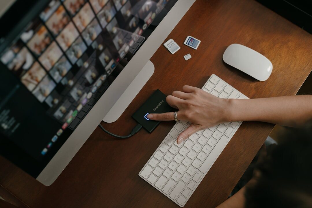 Hands typing on a keyboard with a digital lock icon
