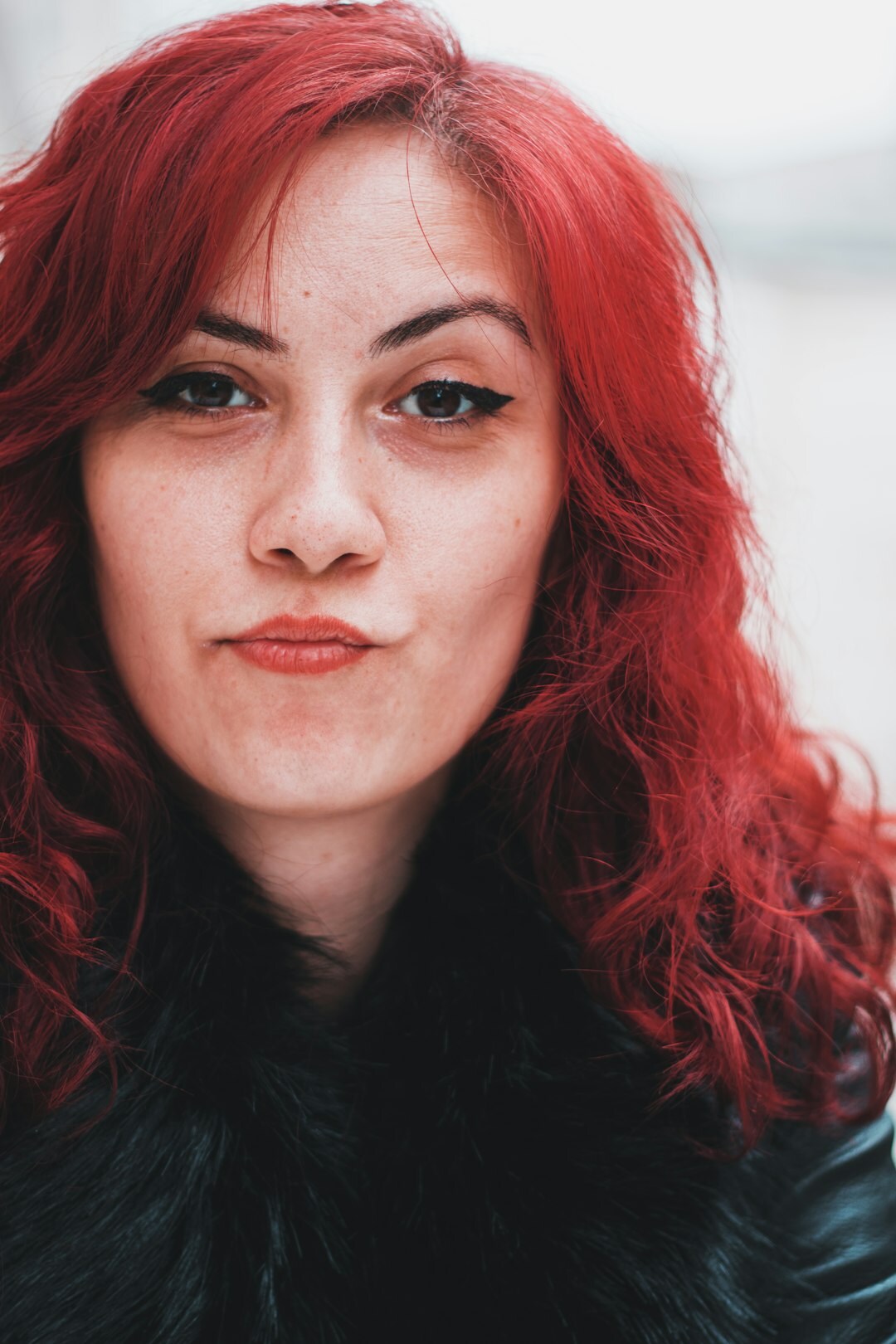 Portrait of a professional woman with red hair